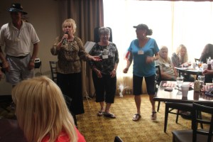 The three ladies sing with Jennifer