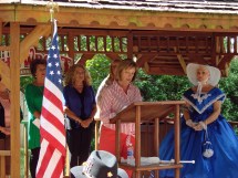 Peggy Carpenter Reading some of the names of "Our Fallen". Gwynn Smith, Branda Merritt and Rose Cairns also read names. Robert "Dutch" Florez rang a bell after each name was read. 